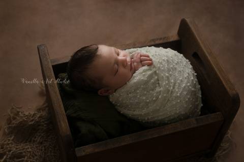 newborn lying down '