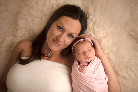 Mum and baby girl sleeping'