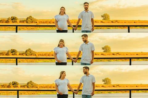 Casal beija na ponte ao entardecer com céu em tons ouro'