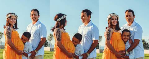 pai-mãe-gestante-filho-familia-posando-em-no-jardim-do-castelo-de-ourem'