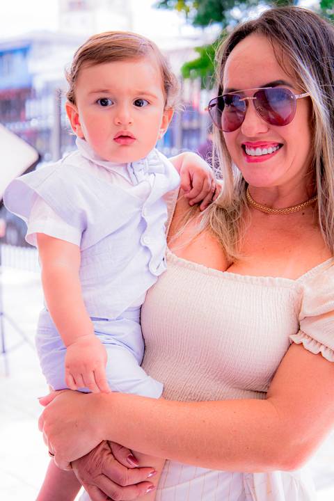 fotografo marco aurelio, batizado de criança em ingreja com a sua familia'