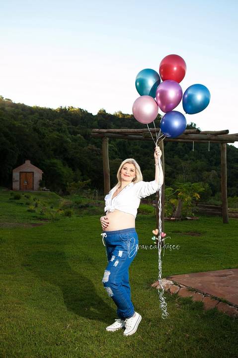 Foto de gestante na natureza'