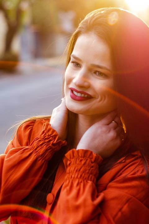 ensaio externo feminino contraluz flare entardecer '
