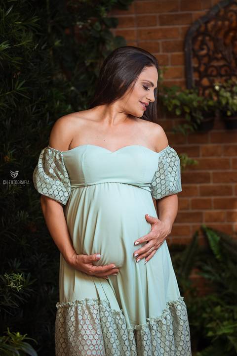Gestante de vestido cor menta'