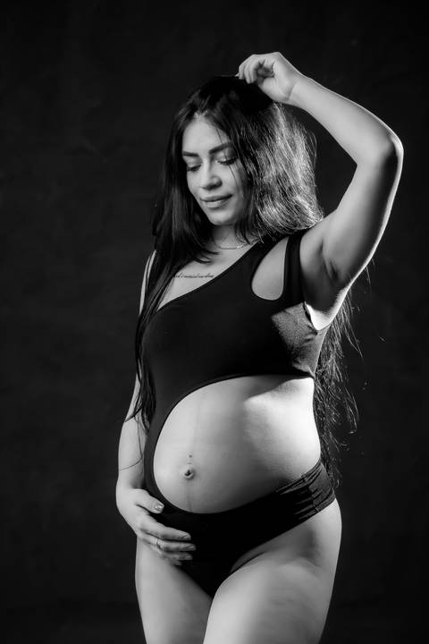 Foto de gestante com body preto'