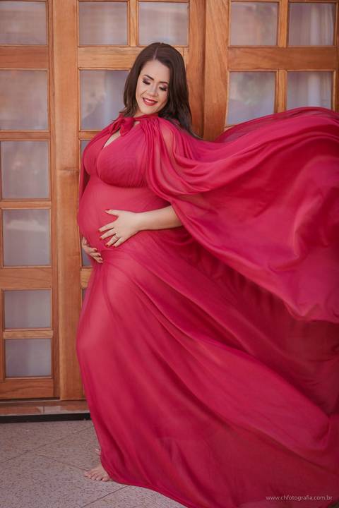 Ensaio de gestante interno, vestido de gestante voando '