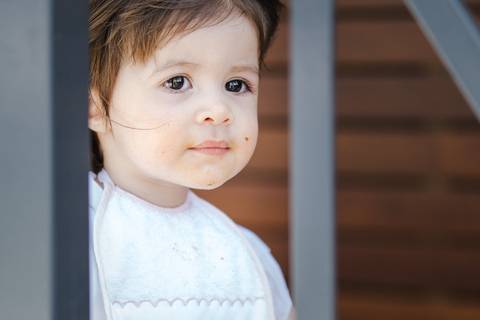 linda criança que foi baptizada'