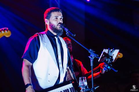 fotografia de evento com banda ao vivo'