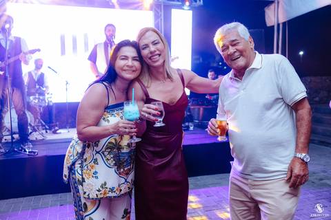 fotografia de festas à beira-mar'