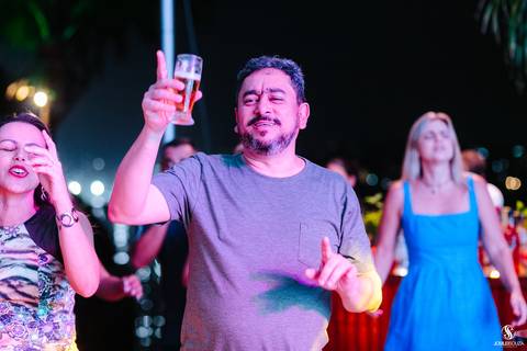 fotografia de festas à beira-mar'