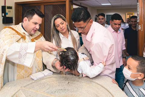 Foto de batismo na Paróquia Sagrado Coração de Jesus'