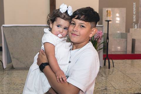 Fotografia do batizado da Maria Fernanda Silva Leite de Ponte na Paróquia Sagrado Coração de Jesus, zona sul de São Paulo.'