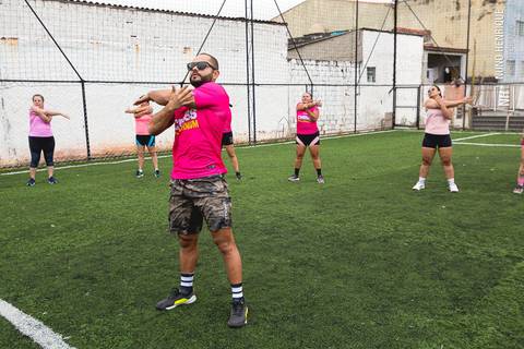 Fotos do aulão especial de Outubro Rosa do Cross Millennium na Arena Ideia & Luz Esportes.'