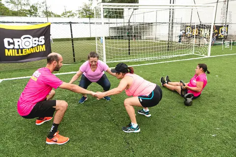 Fotos do aulão especial de Outubro Rosa do Cross Millennium na Arena Ideia & Luz Esportes.'