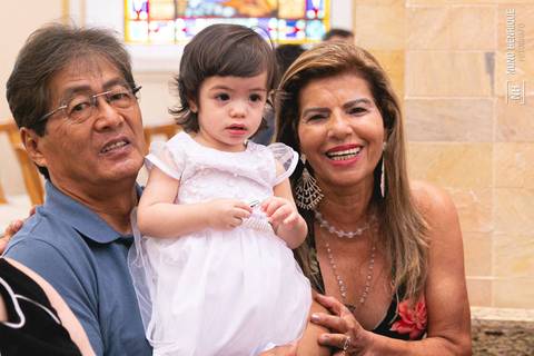 Cerrimônia de batizado da Isabella Ota na Paróquia Nossa Senhora Aparecida de Moema, em São Paulo.'
