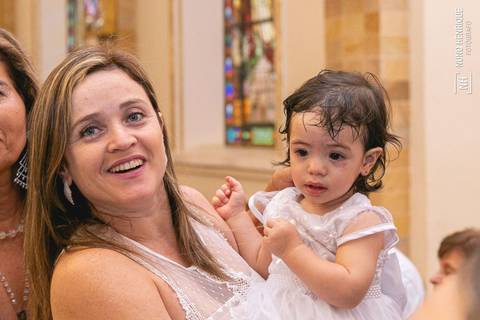 Cerrimônia de batizado da Isabella Ota na Paróquia Nossa Senhora Aparecida de Moema, em São Paulo.'