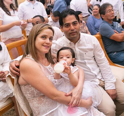 Cerrimônia de batizado da Isabella Ota na Paróquia Nossa Senhora Aparecida de Moema, em São Paulo.'