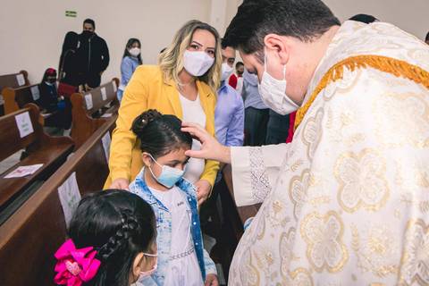 Batizado da Evilly na Igreja do Sagrado Coração de Jesus, diocese de Campo Limpo, zona sul de São Paulo.'