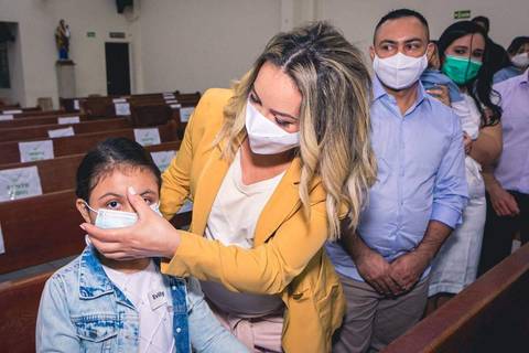 Batizado da Evilly na Igreja do Sagrado Coração de Jesus, diocese de Campo Limpo, zona sul de São Paulo.'