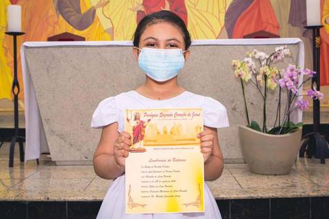 Batizado da Evilly na Igreja do Sagrado Coração de Jesus, diocese de Campo Limpo, zona sul de São Paulo.'