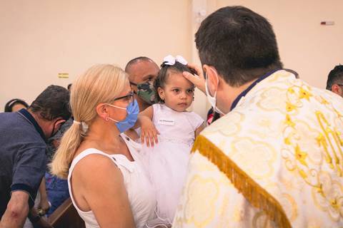 Batizado da Isis Emanuelle na Paróquia Sagrado Coração de Jesus celebrada pelo padre Rodolfo Camarotta, na cidade de São Paulo.'