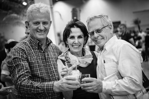 Fotografia de evento social com empresários e diretores da John Deere de Londrina.'