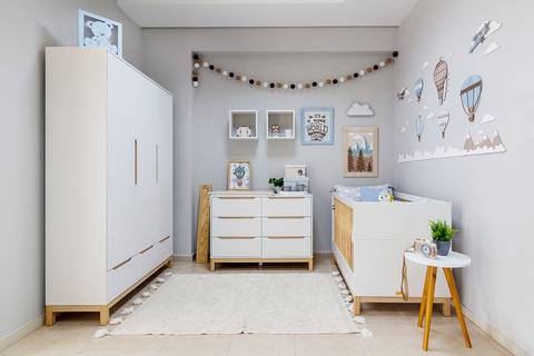 Quartinho branco de bebê fotografado pelo fotógrafo profissional em publicidade Roberto Custódio de Londrina Pr.'