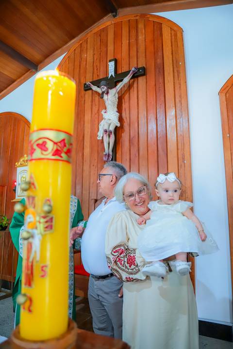 Turistas do Mato Grosso do Sul celebram batismo da filha em Praia do Forte com fotos profissionais durante estadia no Iberostar Bahia.'