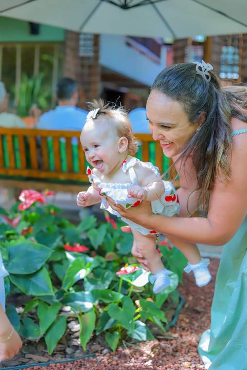 Detalhes da decoração e do ambiente da pousada onde aconteceu a comemoração do batismo.

'