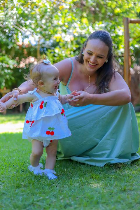 Detalhes da decoração e do ambiente da pousada onde aconteceu a comemoração do batismo.

'