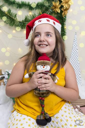 divertida sesion naviudeña con muñecos de navidad, sesiones de fotos de naviddad en rosario, mini sesiones navideñas en rosario para niños, bebes, familia