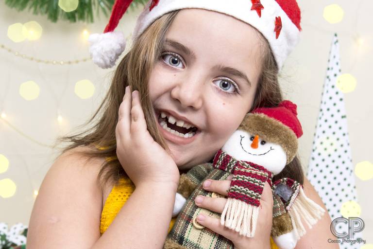 fotos navideñas en estudio, fotos divertidas en familia de navidad, fotografía de estudio, book de fotos en navidad, rosario, santa fe, fotos diferentes de naviudad