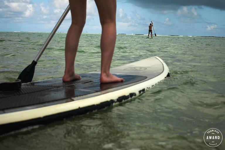Adriana Costa foi premiada pela fearless family por uma foto de sua família em viagem na praia de São Miguel dos Milagres