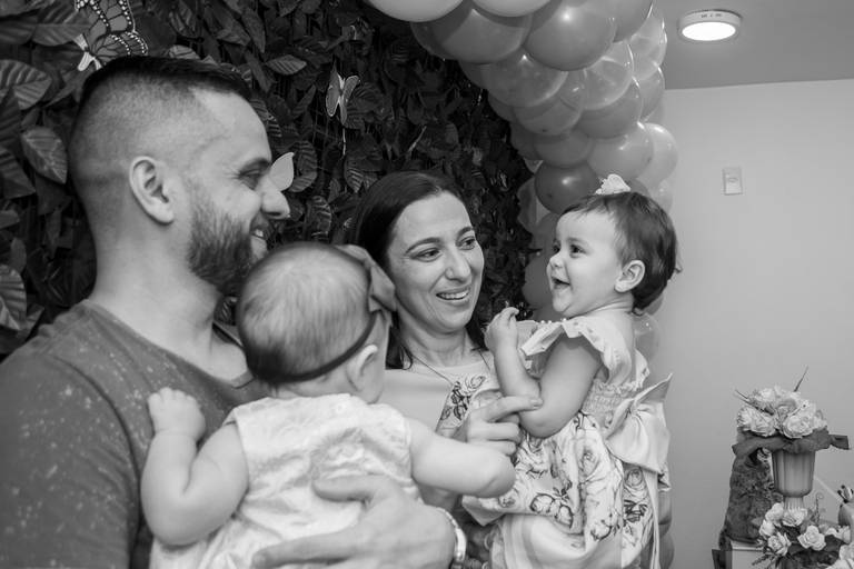 mãe e pai com a filha