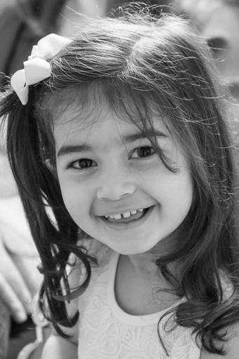 criança posando para o fotografo