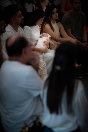 família reunida para o batizado