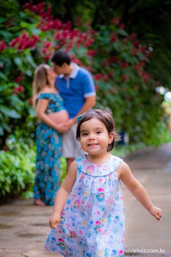 criança com o seus pais