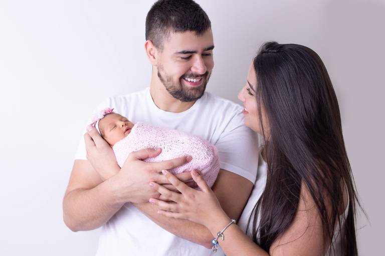casal com bebê em ensaio fotografico
