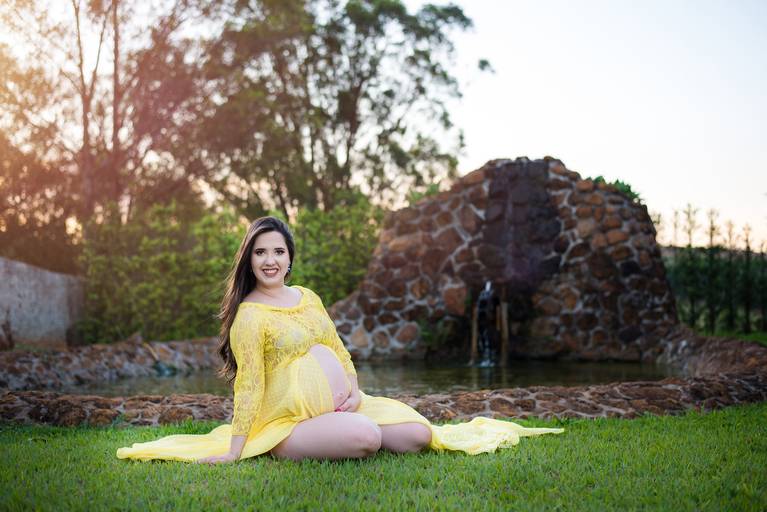 book de gestante no por do sol 