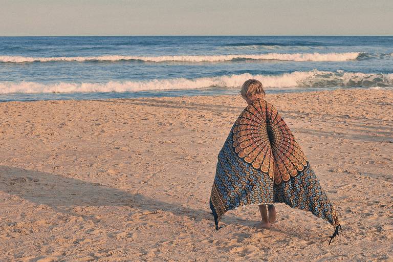 fotografia de menino argentino na praia do rosa