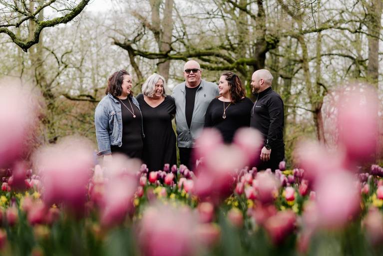 Family vacation photos taken in Keukenhof Gardens during tulip season, a recommended experience for river cruise passengers stopping near Amsterdam.