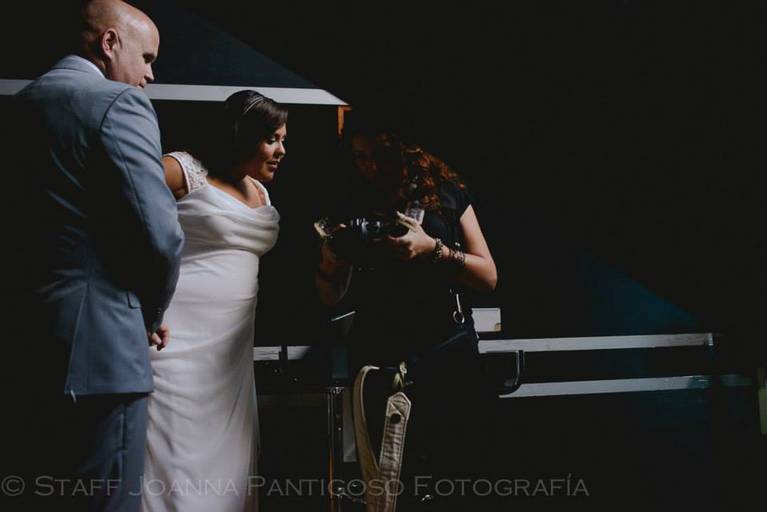 Showing images to my newlyweds after their wedding portraits while waiting for the wedding reception. Images taken by my amazing second shooter Jamil. 