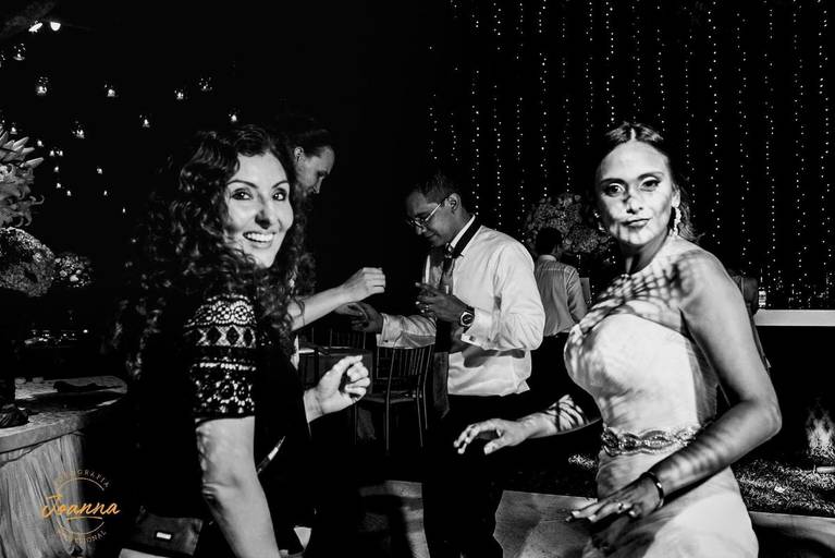 When two worlds got together and the photographer also enjoys the party. Here dancing with Bride Silvie during her wedding day. Andrés, the Groom is the one who made the click.