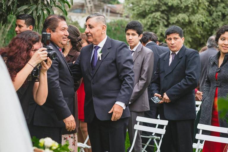 Bride is walking up the aisle, backstage picture from my second shooter. 