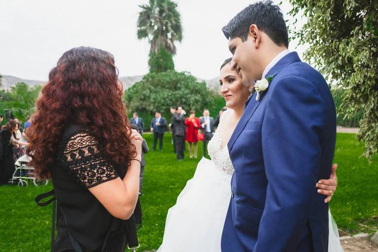 Giving instructions for the couple during their wedding portraits. I do instructions firsts to make documentary style . Yes, I prefer to give you options, for you to know what to do if you need direction. Wedding Photography  is a team work.