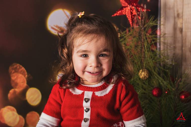 Irmão mais nova na sessão fotográfica de natal