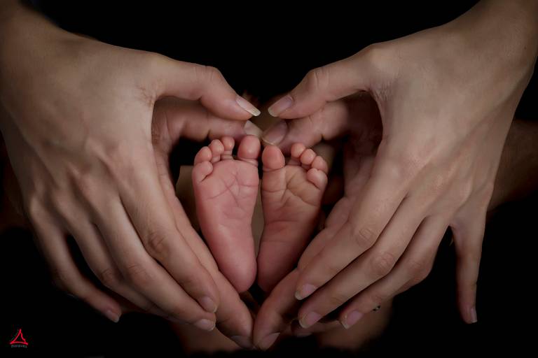 Coração com o pé do bebé