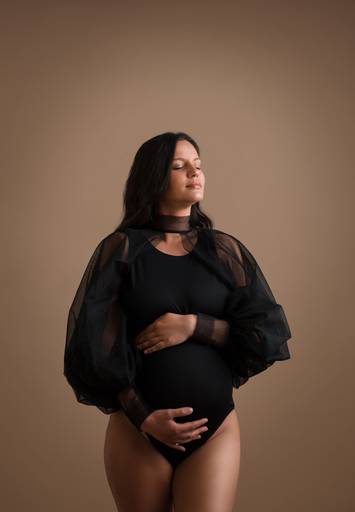 sessão fotos body preto
fundo bege grávida