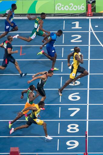 Chegada para a medalha de ouro do Usain Bolt nos 100 metros rasos nas olimpíadas de 2016 no Rio de Janeiro - Fotografia profissional institucional  e corporativa para empresas e grandes eventos