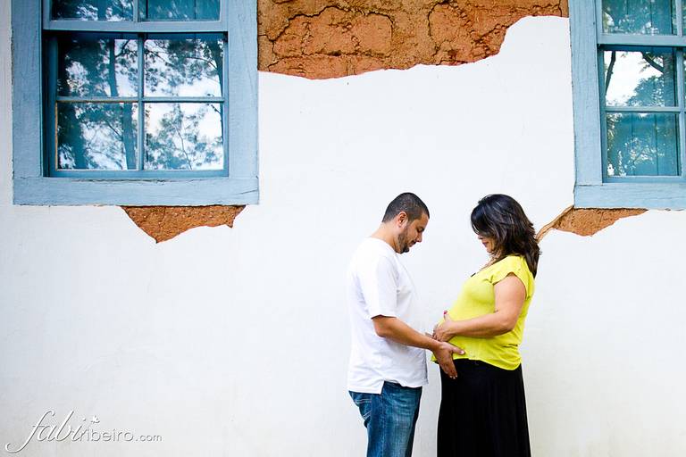 Grávida com marido fotografia